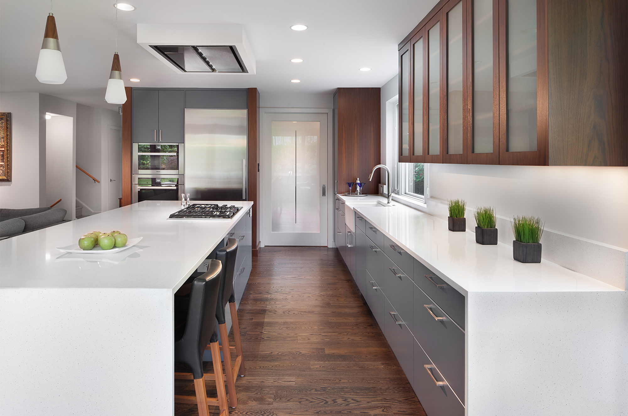 Steel blue and walnut kitchen cabinetry