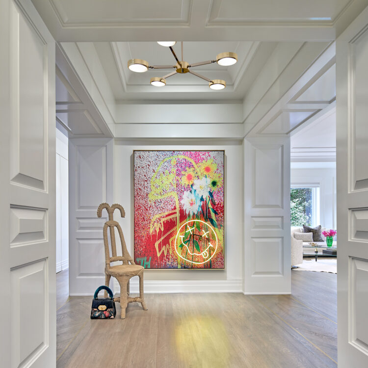 Colorful artwork in the entryway of a DC penthouse