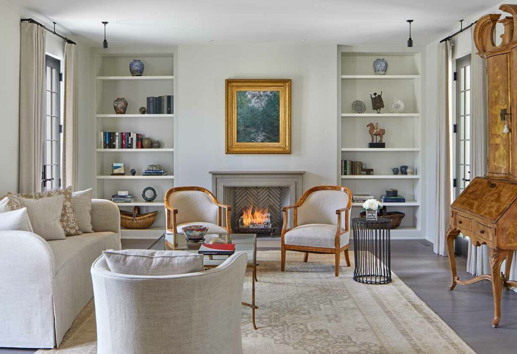 formal living room with fireplace in a bethesda home that was transformed by the design build team at Anthony Wilder