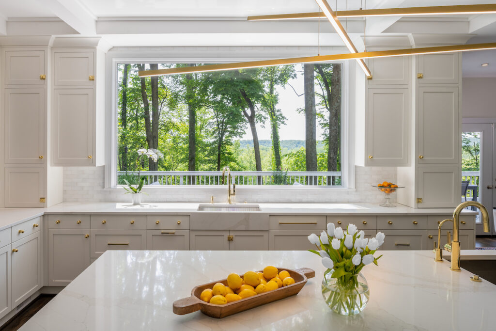 Sculptural pendant lighting over kitchen island