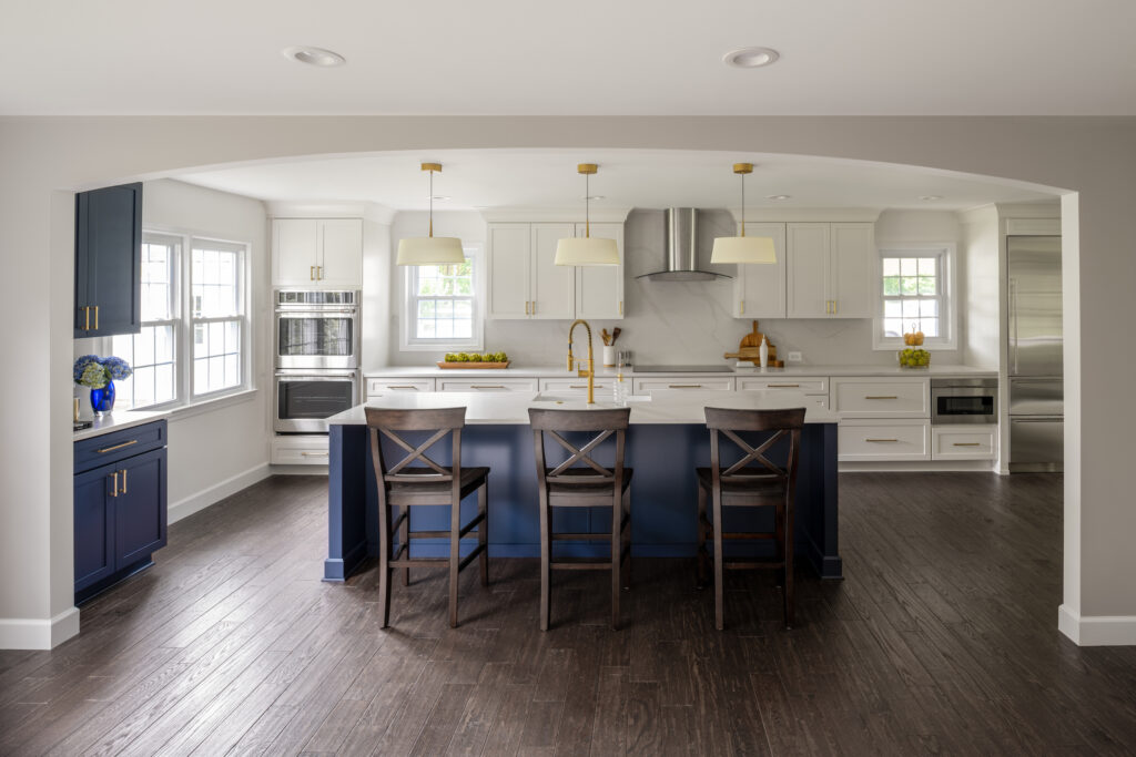 Kitchen opened up by a wall being knocked down and creating a great arch