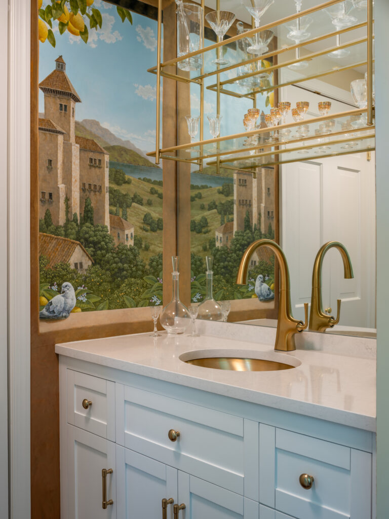 Custom Italy inspired wallpaper atop a newly installed wet bar with brushed gold shelving