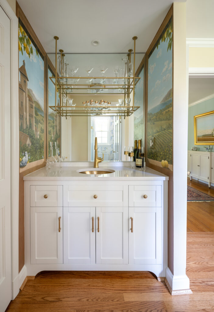 Custom Italian painting surrounding a wet bar placed in a nook