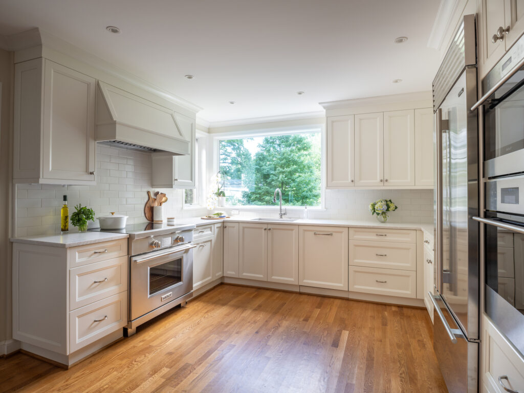 kitchen renovation which now allows tons of cooking space and natural light from the large window installed over the sink